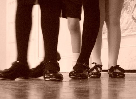 Children in tap shoes showing only their legs